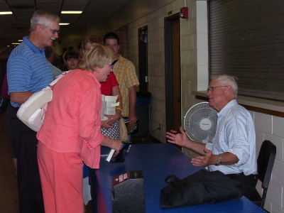 John Sandford talks with fans